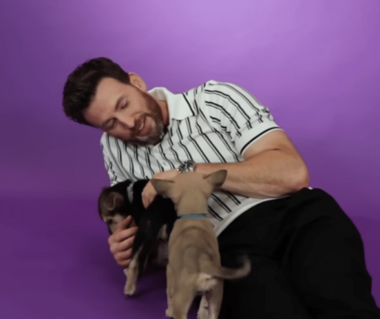 Chris Evans with his dog Dodger, a boxer mix, showcasing their special bond